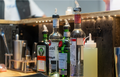Udvalg af spiritusflasker opstillet på MM Rental Bar til event